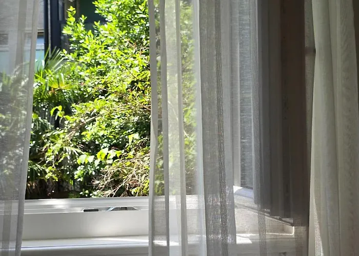 Adelle - By Guide Апартаменты